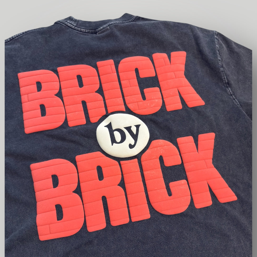 BRICK-by-BRICK – Built Not Given Tee